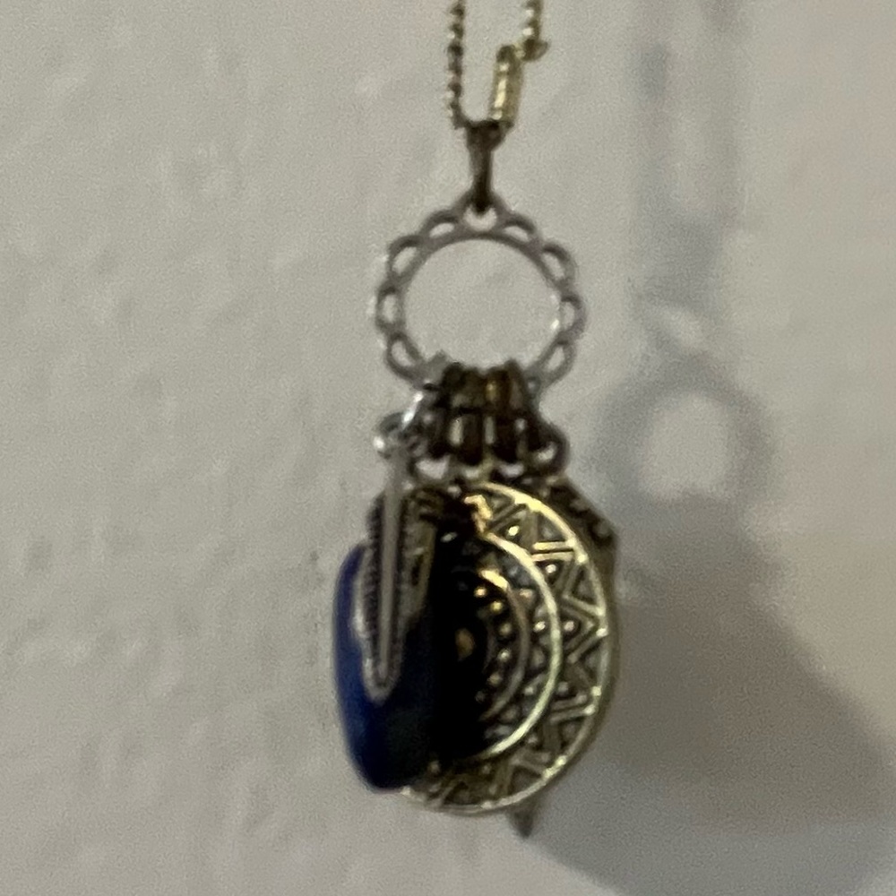 American Eagle Long Multi-Charm Blue, Gold, and  Silver Necklace